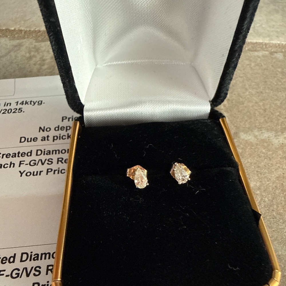 Diamond pear shaped, NWT, two beautiful matching studs of Lab created Diamonds.
